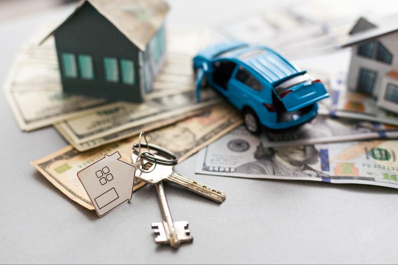 A model house and car with deposit money.