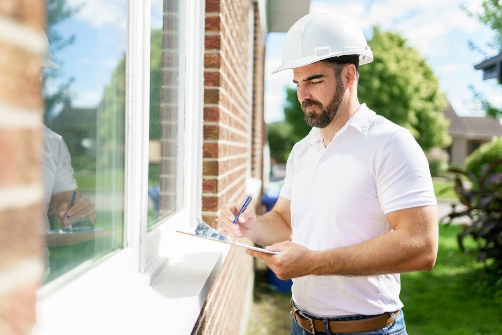 Man conducting a termite home inspection.