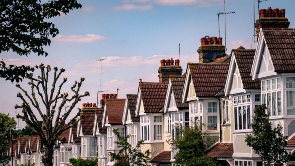A row of houses around sunset.