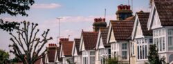 A row of houses around sunset.