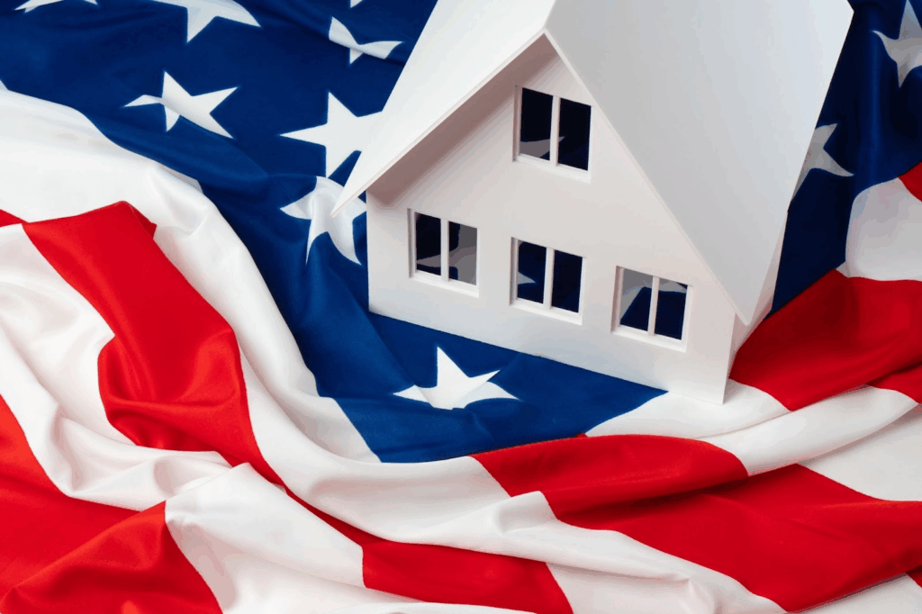Model house on a United States flag